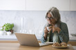 Mature woman with laptop computer