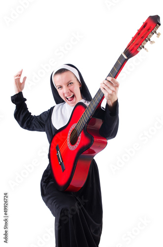 Photo: Nun playing guitar isolated on white Nun playing guitar isolated on white