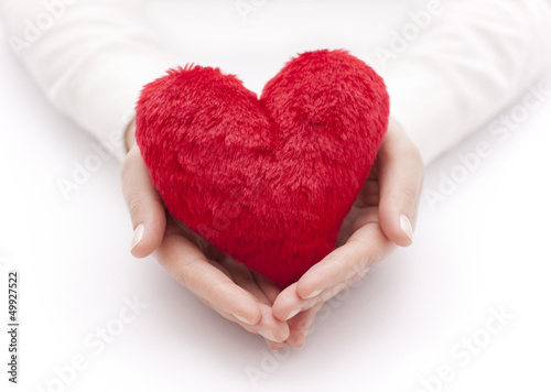 Photo: Red heart in woman hands Red heart in woman hands