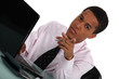 Young businessman pointing his finger