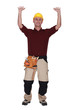 Manual worker with arms raised