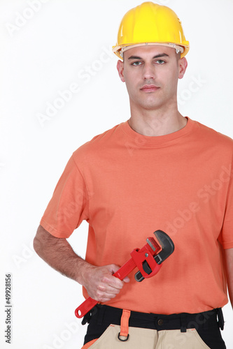 Photo: Portrait of an annoyed tradesman Portrait of an annoyed tradesman