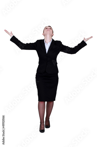 Photo: Businesswoman with raised arms Businesswoman with raised arms