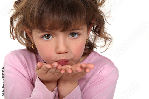 Photo: little girl sending a kiss little girl sending a kiss