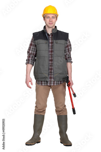 Photo: craftsman holding a spanner craftsman holding a spanner