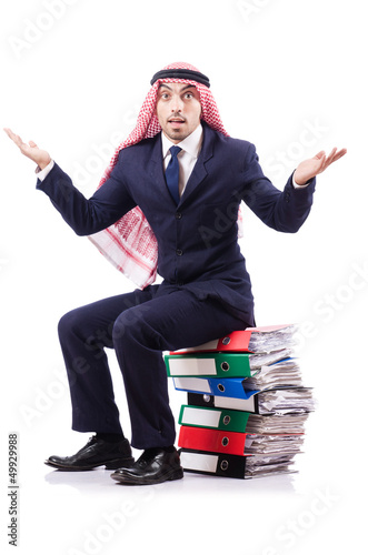 Photo: Arab businessman with many folders on white Arab businessman with many folders on white