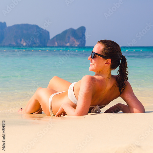 Photo: lying on beach lying on beach