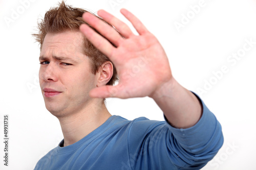 Photo: Man making stop gesture Man making stop gesture