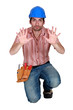 Tradesman holding up his hands