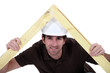 carpenter making a wooden frame