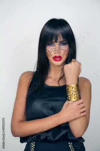 Photo: Beautiful fashion Girl with makeup Beautiful fashion Girl with makeup
