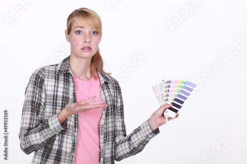 Photo: Woman overwhelmed by choice Woman overwhelmed by choice