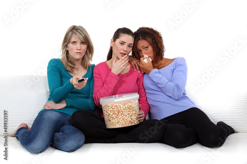 Photo: Girls watching a sad film Girls watching a sad film