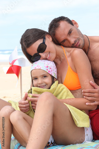 Photo: happy family at beach happy family at beach