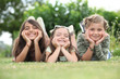 Photo: Girls lying on grass Girls lying on grass