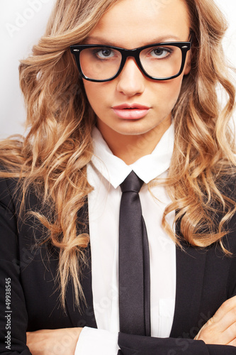 Photo: closeup seriously businesswoman portrait closeup seriously businesswoman portrait