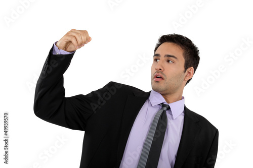 Photo: Successful businessman raising his fist Successful businessman raising his fist