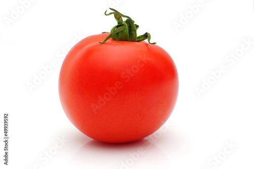 Photo: Fresh tomato isolated on white background Fresh tomato isolated on white background