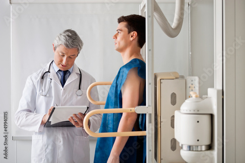 Photo: Male Patient Undergoing X-ray Test Male Patient Undergoing X-ray Test