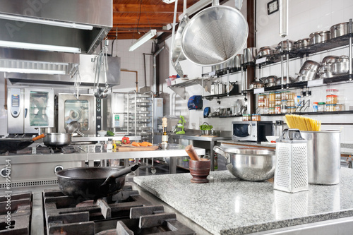 Photo: Utensils On Counter In Commercial Kitchen Utensils On Counter In Commercial Kitchen