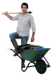 Mason posing by his wheelbarrow