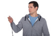 Personal trainer stood with stopwatch