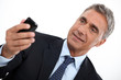 Older man checking his cellphone