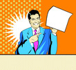 happy advertising man with sheet of paper in a hand in pop art c