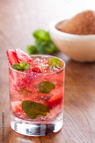 Photo: Strawberry mojito served with lime and crushed ice Strawberry mojito served with lime and crushed ice