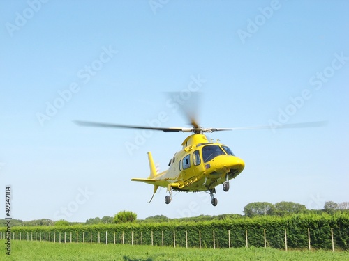 Photo: ambulance helicopter takes off fast carrying a serious injury ambulance helicopter takes off fast carrying a serious injury
