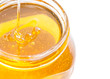 Foto: Golden honey in pot for healthy nutrition. Golden honey in pot for healthy nutrition.