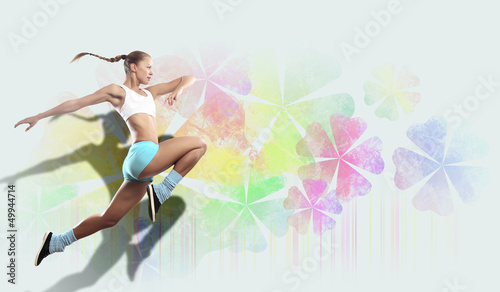 Photo: Image of sport woman jumping Image of sport woman jumping