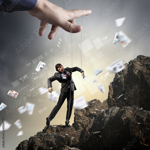 Photo: Business man marionette Business man marionette