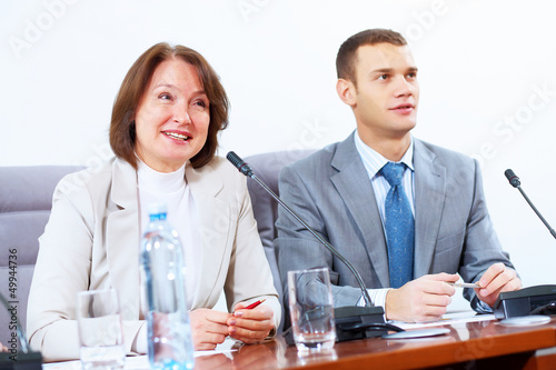 Photo: Two businesspeople at meeting Two businesspeople at meeting
