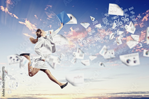 Photo: Image of jumping businesswoman Image of jumping businesswoman