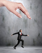 Business man marionette