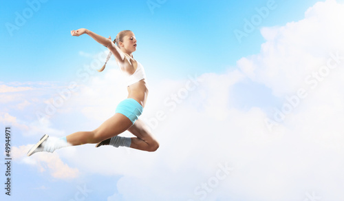 Photo: Image of sport woman jumping Image of sport woman jumping