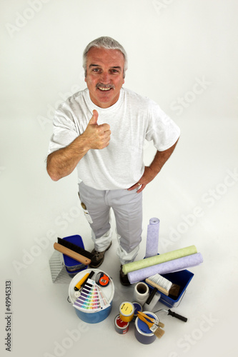 Photo: Decorator giving the thumbs-up Decorator giving the thumbs-up