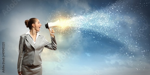 Photo: businesswoman with megaphone businesswoman with megaphone