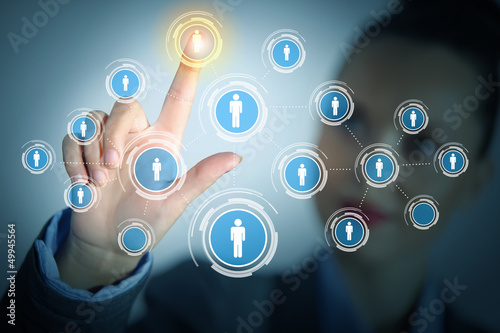 Photo: Image of female touching icon of social network Image of female touching icon of social network