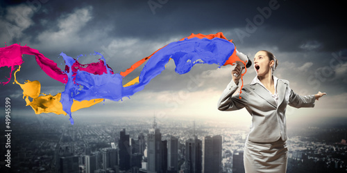 Photo: businesswoman with megaphone businesswoman with megaphone