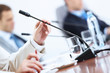 Hands of businessman holding microphone