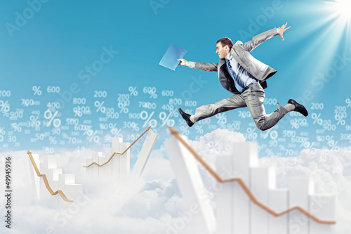 Photo: Image of jumping businessman Image of jumping businessman