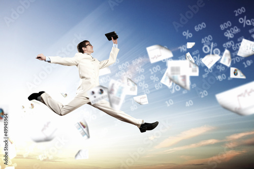 Photo: Image of jumping businessman Image of jumping businessman