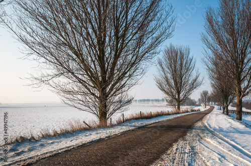Photo: Narrow country road in winter Narrow country road in winter