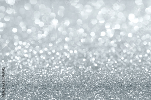 Photo: Shiny silver defocused background with copy space Shiny silver defocused background with copy space