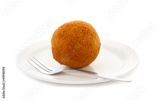 Photo: Egg ball (Eierbal) served on saucer Egg ball (Eierbal) served on saucer