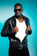 Cool urban stylish black american man. Fashion studio shot.