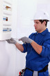 electrician with electric meter