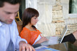 Photo: Woman using a laptop outside Woman using a laptop outside